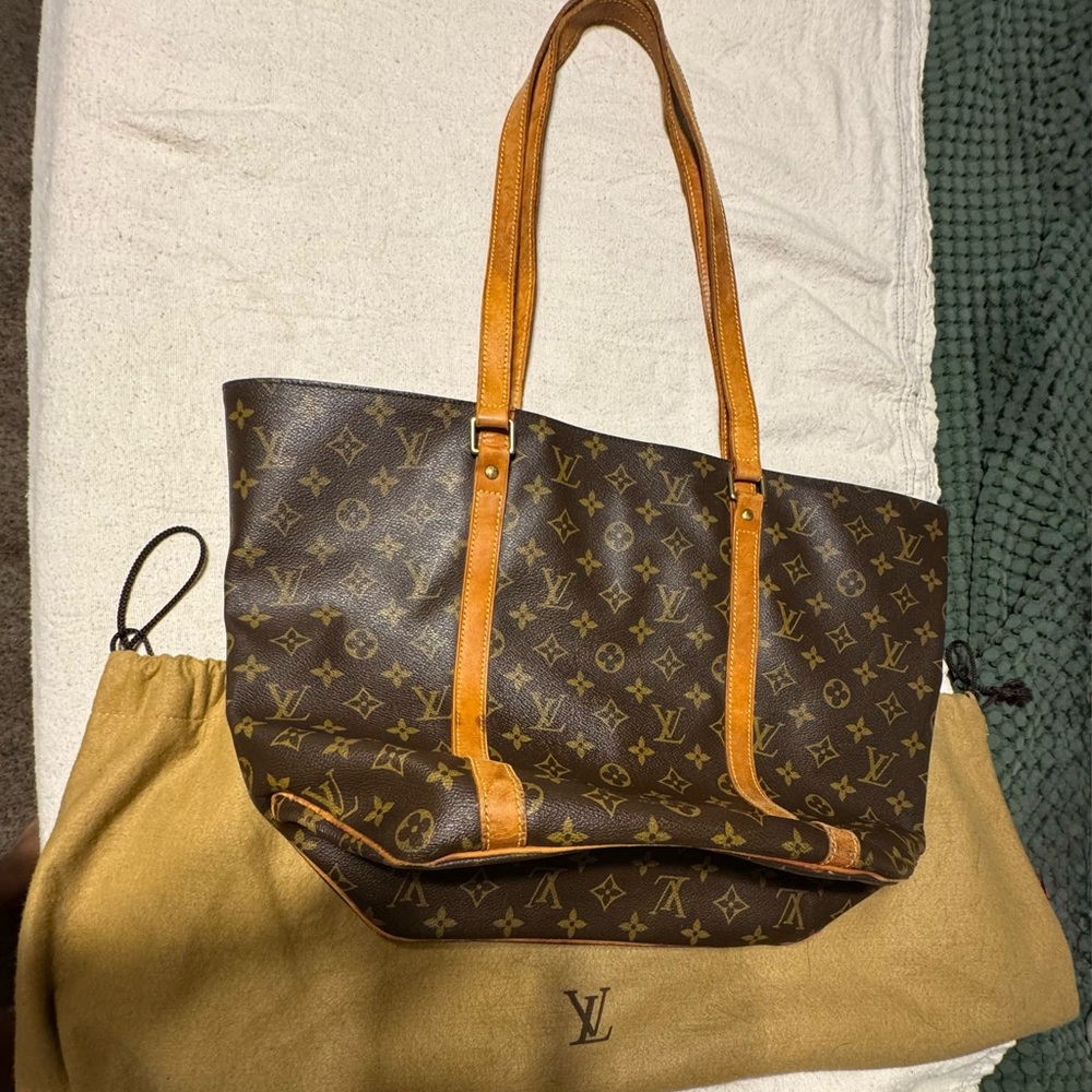 Louis Vuitton Monogram Tote in Dark Brown with Tan Straps. Good condition.